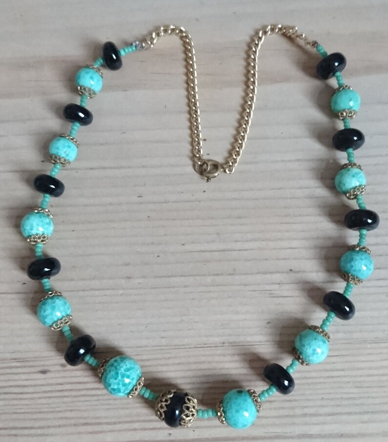 Vintage green and black glass bead necklace