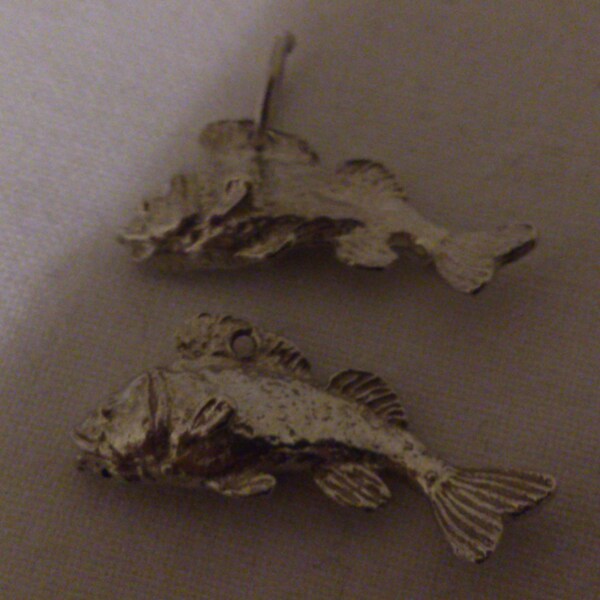 two vintage sterling silver fish charms