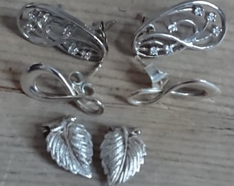 Three pairs of sterling silver earrings