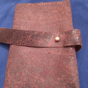 Textured leather refillable journal cover with strap and stud closure