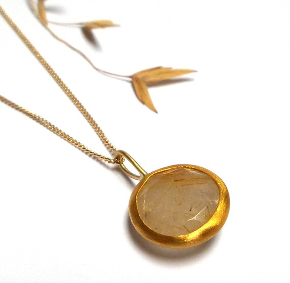 Gold quartz pendant best sale