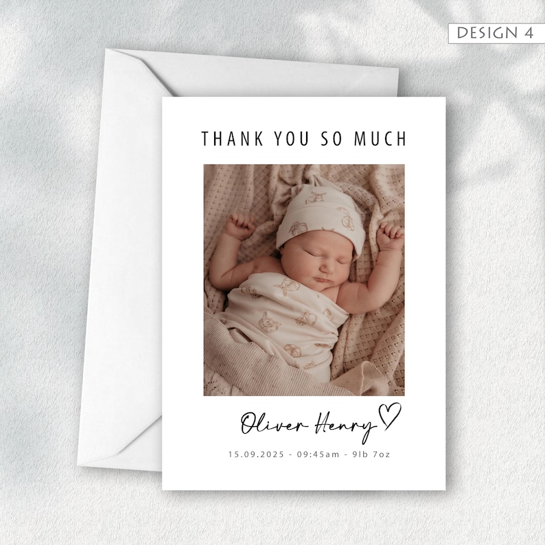 May include: A white card with a photograph of a sleeping baby wearing a hat and matching outfit. The card reads "THANK YOU SO MUCH" above the photo. Below the photo is the name "Oliver Henry" and the date, time, and weight of the baby. A white envelope is included.