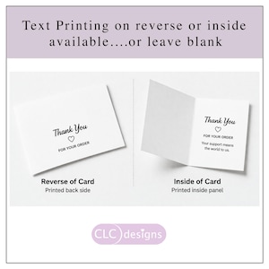 May include: White thank you cards with black text. One card is closed, showing the front with "Thank You" and a heart. The other card is open, revealing the inside text: "Thank You" and "Your support means the world to us."
