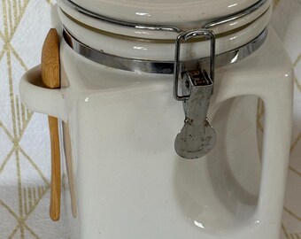 Vintage 7” airtight white ceramic square corner canister with wooden spoon
