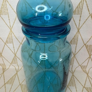 Vintage turquoise blue Apothecary jar with lid made in Taiwan see description for flaw