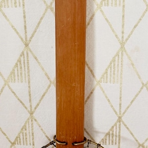 May include: A vintage wire mesh strainer with a wooden handle. The handle is marked with "4".