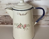 Vintage white enamel coffee pot with flowers farmhouse kitchen Monterrey Mexico