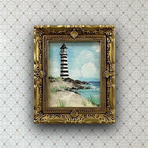 Original miniature seascape painting “Lighthouse.”