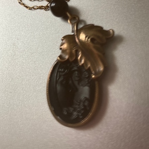 Black glass cameo, Cameo pendent, Black glass pendent, 1980s Mid century, Modern cameo, Carved Glass, Cameo with Brass leaf, 18 inch chain