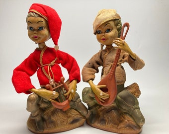 Músicos da arte folclórica europeia, tocadores de bandolim e harpa, decoração de mesa