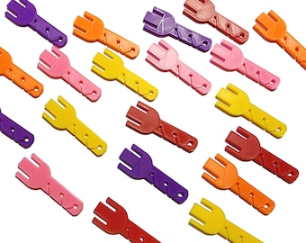 May include: A collection of 14 colorful plastic forks, each with a unique design. The forks are arranged in a staggered pattern on a white background. The forks are all different colors, including red, orange, yellow, green, blue, purple, and pink.