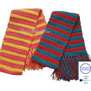 May include: Two crocheted striped scarves with fringe ends. One scarf is pink and yellow, the other is red and teal. The scarves are laid out on a white background. The text "CROCHET PATTERN" is on a white circle with a blue border. The text "Gigi's Blue Rose" is below the circle.