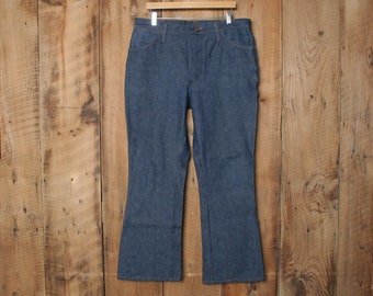 Rozmiar 37x30 | Vintage WRANGLER 'No Fault' Niebieskie jeansy typu bootcut z rozszerzanymi nogawkami - Wyprodukowano w USA