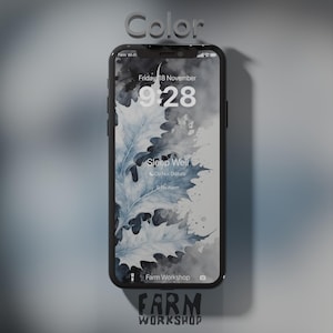 May include: A black smartphone with a white and gray leaf pattern wallpaper. The screen displays the time 9:28, the date Friday 18 November, and the text "Sleep Well". The phone also shows the text "Farm Workshop" at the bottom of the screen.
