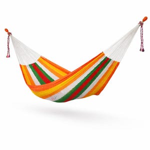 May include: A colorful hammock with orange, yellow, green, red, and white stripes. The hammock is suspended by white ropes and has decorative tassels at each end. Perfect for outdoor relaxation.