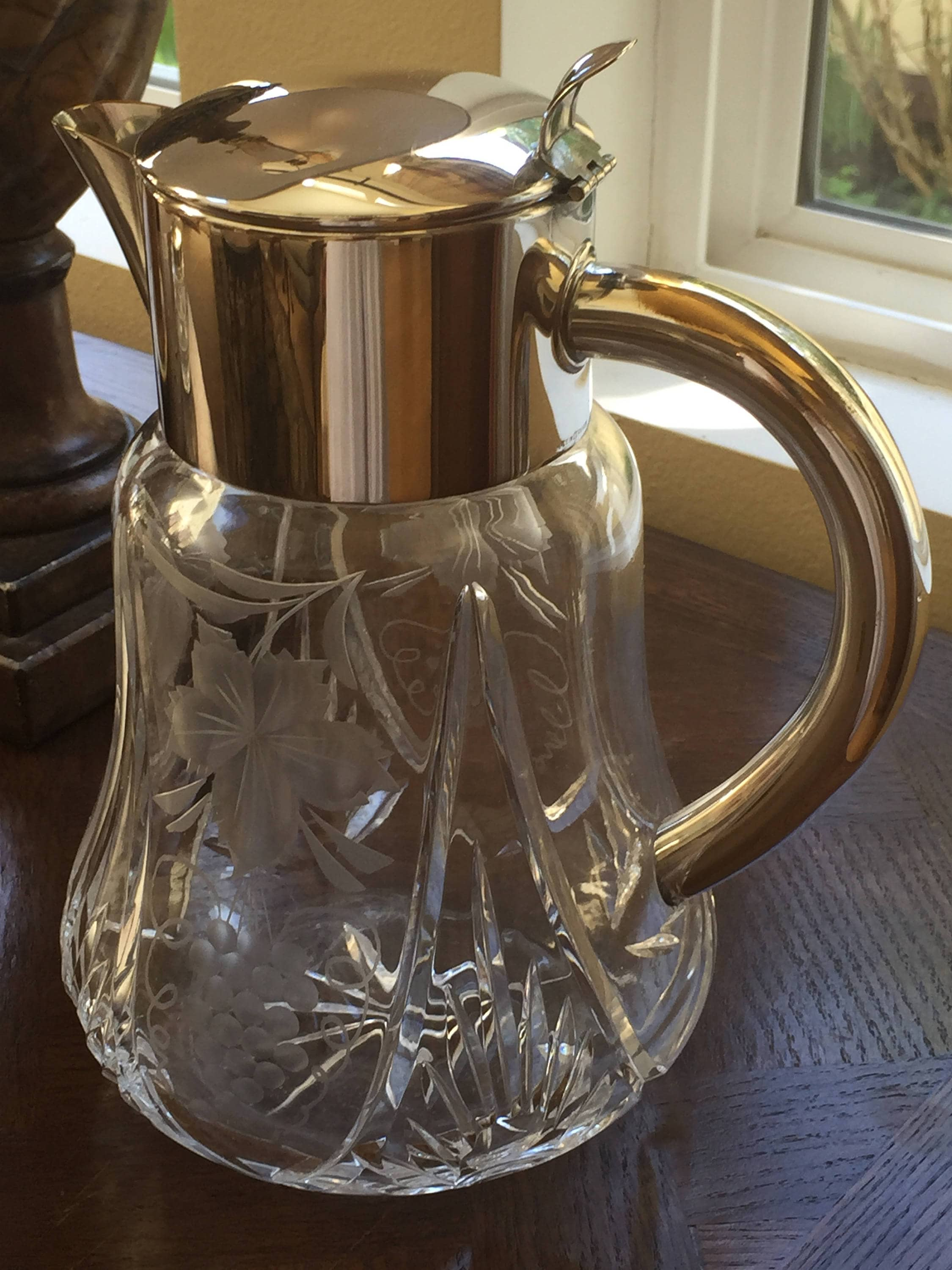 Antique Clear Glass Lidded Pitcher with Etched Grape Vine Motif