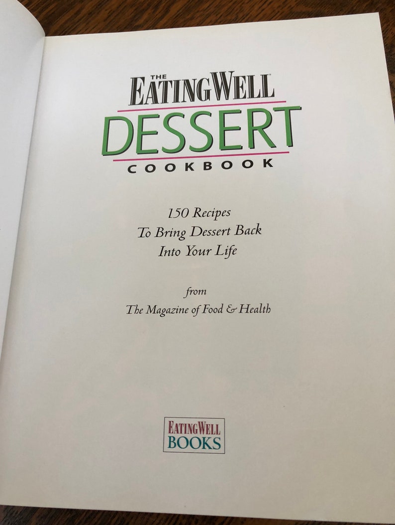 May include: The Eating Well Dessert Cookbook cover features a green and white logo with the text "Eating Well Dessert Cookbook" and the tagline "150 Recipes To Bring Dessert Back Into Your Life". The cover also includes the text "from The Magazine of Food & Health" and the Eating Well Books logo.