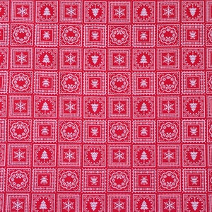 May include: Red fabric with a white repeating pattern of Christmas trees, snowflakes, bells, and wreaths.