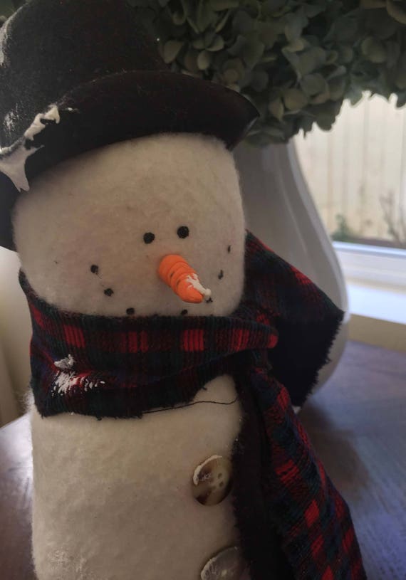 large stuffed snowman