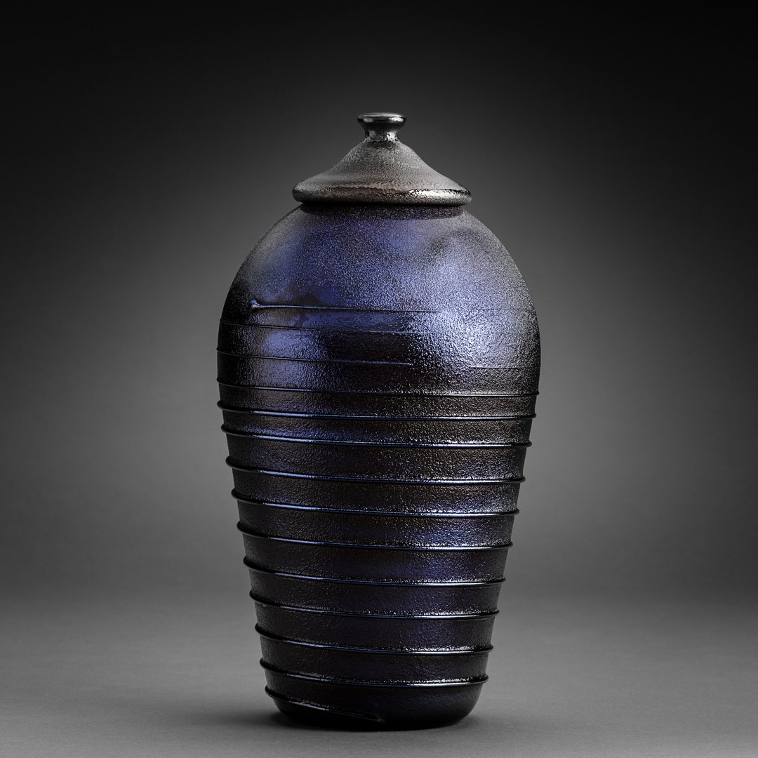 Illustration of Industrial Metallic Urn Decor