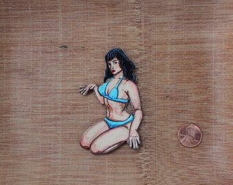 Betty Page en un Bikini azul