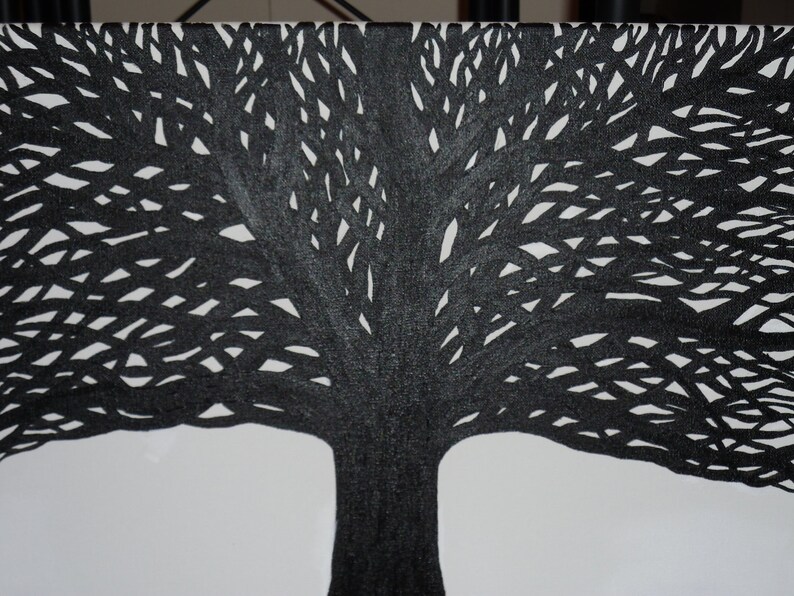 May include: Black and white illustration of a tree with a thick trunk and many branches. The branches are drawn with a series of lines that create a detailed and intricate pattern.