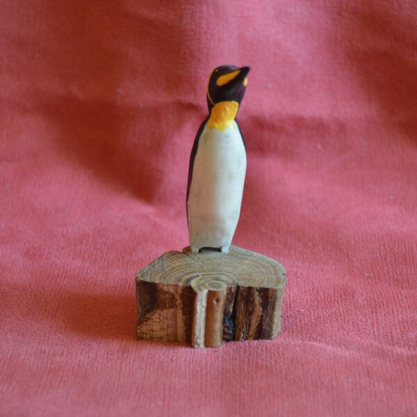 Carved Penguin on Stump