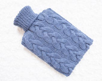 Hand knitted hot water bottle cover / cozy in denim blue. Rustic bedroom / home decor that makes a perfect handmade Christmas gift. Hygge!