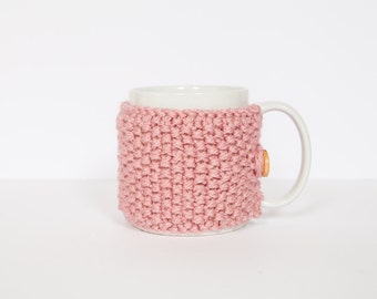 A knitted mug cosy, cup cosy, mug cosies, coffee cosy in pink. Coffee mug cosy / coffee sleeve as a coffee gift!