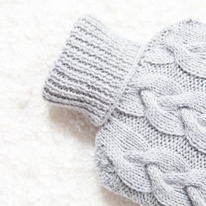 Hand knitted hot water bottle cover / cozy in light grey. Rustic bedroom / home decor that makes a perfect handmade Christmas gift. Hygge image 2