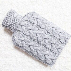 Hand knitted hot water bottle cover / cozy in light grey. Rustic bedroom / home decor that makes a perfect handmade Christmas gift. Hygge image 1