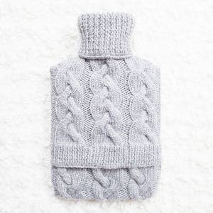 Hand knitted hot water bottle cover / cozy in light grey. Rustic bedroom / home decor that makes a perfect handmade Christmas gift. Hygge image 4