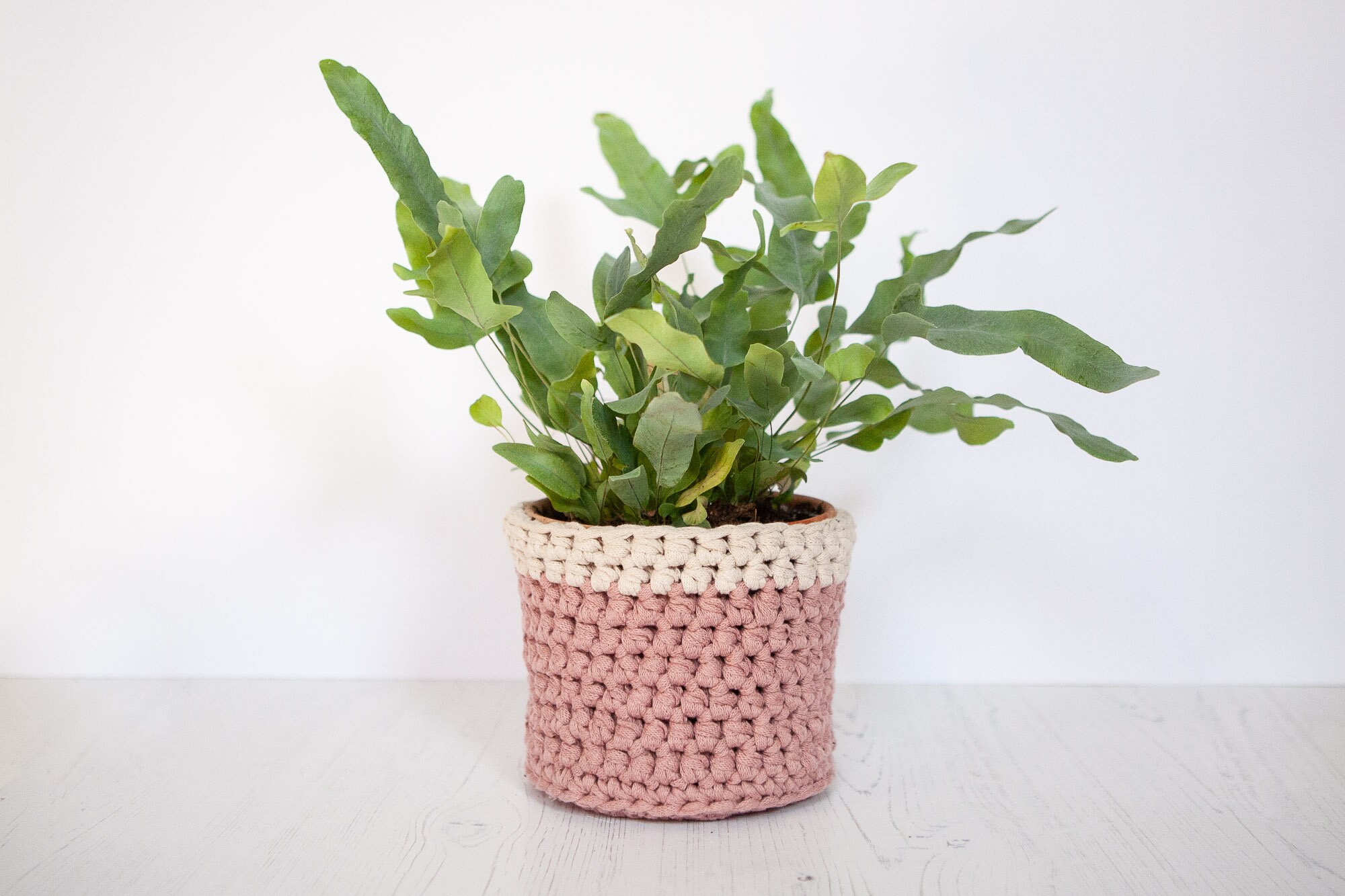 Medium plant pot cover in pink & cream. Made from recycled cotton. Perfect present for a plant lover!