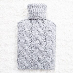 Hand knitted hot water bottle cover / cozy in light grey. Rustic bedroom / home decor that makes a perfect handmade Christmas gift. Hygge image 3