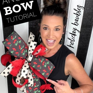 May include: A woman demonstrates how to make an angel bow with red and white polka dot ribbon, black and white polka dot ribbon, and red ribbon with a cherry print. The text "ANGEL BOW TUTORIAL" is visible in the image. The text "holiday baubles" is written vertically on the right side of the image.