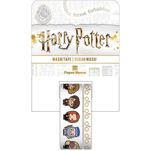 May include: A white washi tape roll with a gold border and a repeating pattern of Harry Potter characters. The tape is packaged in a white cardboard box with the words "Harry Potter" and "Washi Tape | Ruban Washi" printed in gold. The box also features the Paper House logo.