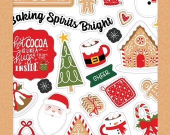 May include: An Echo Park Paper Co. sticker book containing die-cut cardstock stickers with Christmas motifs. The designs feature a gingerbread house, Santa Claus, hot cocoa mugs, a Christmas tree, and text reading Baking Spirits Bright.
