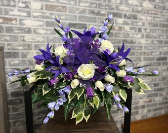 Memorial Day cemetery saddle -  tombstone arrangement, purple& cream mix flowers with purple ribbon. Spring cemetery flowers- Veterans Day