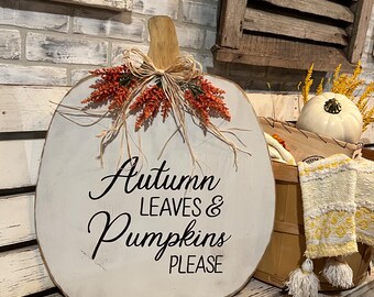 24” white pumpkin cutout, hand painted “ Autumn leaves and pumpkins please“ with floral and bow