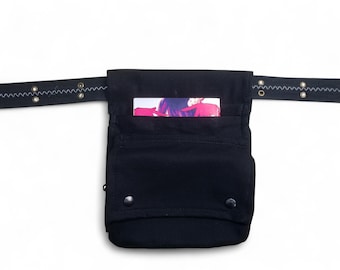 Belt bag, made of black cotton canvas fabric, to carry extra waist pockets