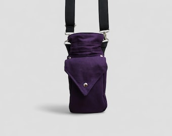 Dark purple bag for water bottle, water carrier for hiking, the beach, a festival with extra front pocket with zipper for phone and purse.