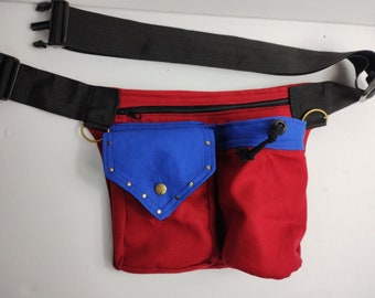 Red blue hip bag with an extra bottle pocket, triangle flap, made of 2 colors cotton canvas,  for all sizes, sturdy black click buckle