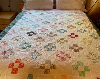 Full size adorable 1956 9 patch twin sized quilt in wonderful condition.