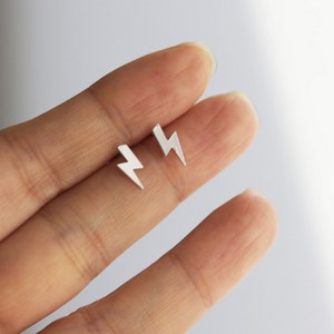 tiny Lightning bolt Spring showers earrings in matte gold or matte silver finish