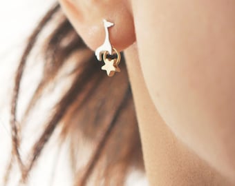 giraffe with gold star stud earrings