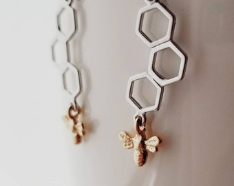 Bumble honey bee earrings! Honeycomb with tiny buzzing bee dangling on titanium hooks