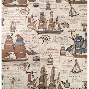 May include: A beige fabric featuring a repeating nautical print of vintage sailing ships, maritime lanterns, compasses, and anchors. The design includes historical text snippets and advertisements for shipping lines like White Star Line.