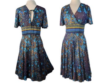 1970s flutter sleeve A-line vintage blue floral print jersey mini dress