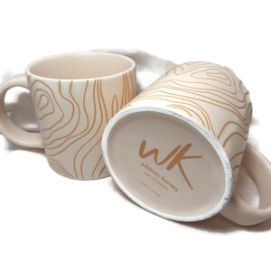 Two Whitney Kerney Mugs/Off-White and Terracotta Abstract/ 12 Ounce