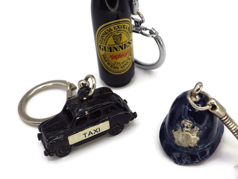 Keychains/ Bag Charms/ Three London/ England/Taxi/ Guinness Beer/ Bobby Hat image 1